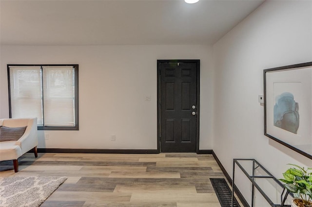 foyer with light hardwood / wood-style flooring