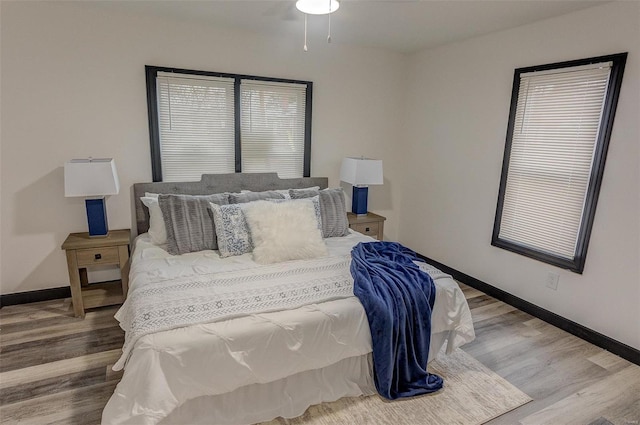 bedroom featuring wood-type flooring