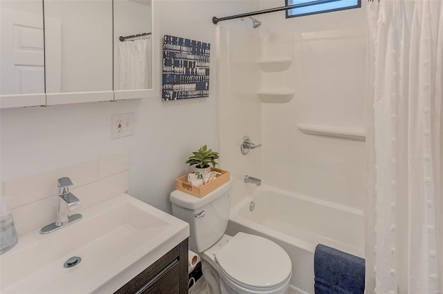 full bathroom featuring shower / bathtub combination with curtain, vanity, and toilet