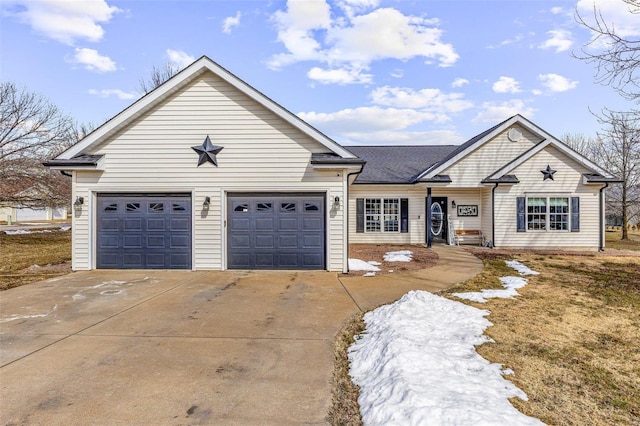 view of front of house featuring a garage and driveway