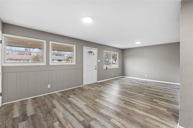 foyer entrance with hardwood / wood-style flooring