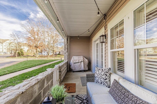 balcony featuring a porch