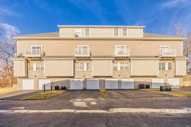 view of building exterior featuring central AC unit