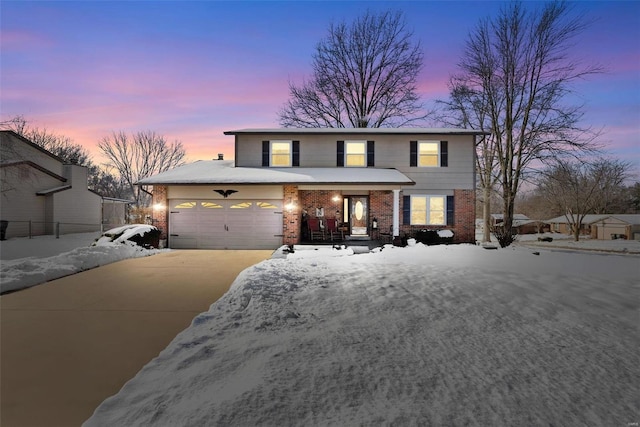 front facade with a garage