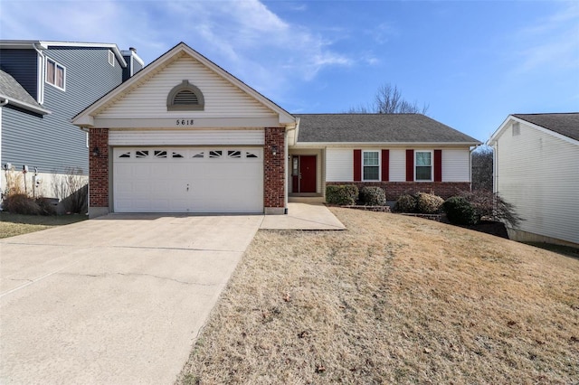 ranch-style home with a garage and a front yard