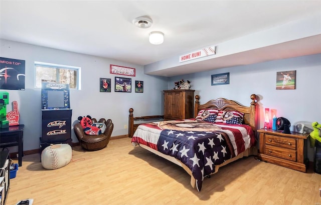 bedroom with light wood-type flooring