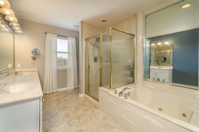 bathroom featuring vanity and plus walk in shower