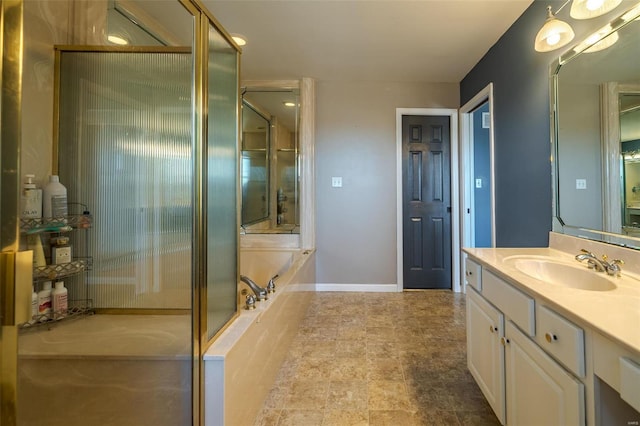 bathroom with independent shower and bath and vanity