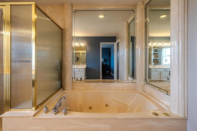 bathroom featuring vanity and a bathing tub