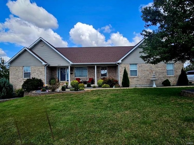 ranch-style house featuring a front yard