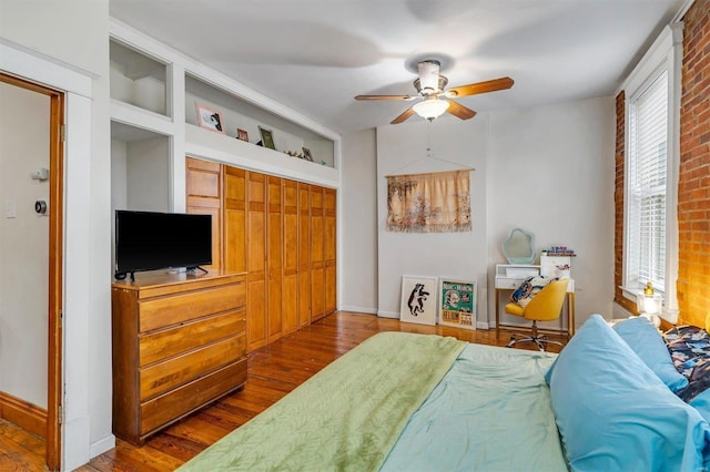 bedroom featuring wood-type flooring and ceiling fan