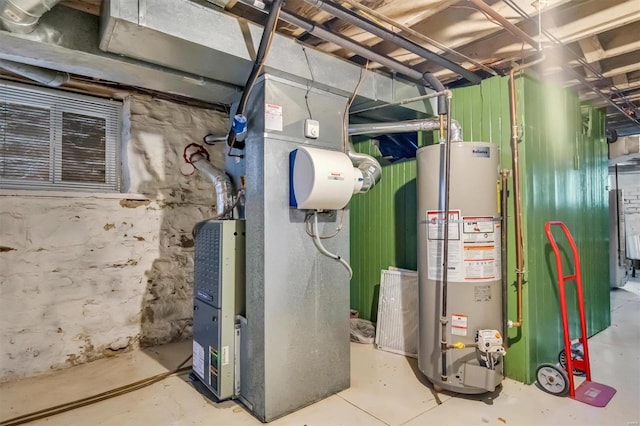 utility room featuring water heater