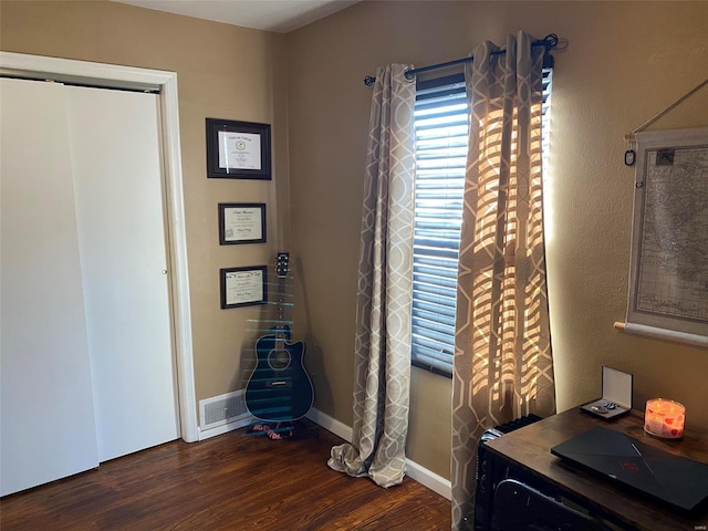 interior space featuring dark hardwood / wood-style floors