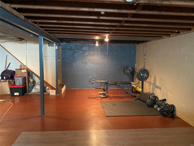 workout area featuring hardwood / wood-style flooring