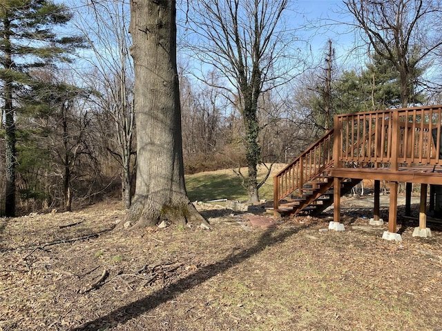 view of yard featuring a wooden deck