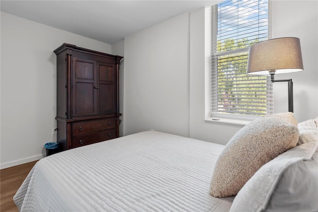 bedroom featuring hardwood / wood-style floors