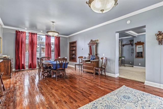 dining area featuring ornamental molding and hardwood / wood-style floors