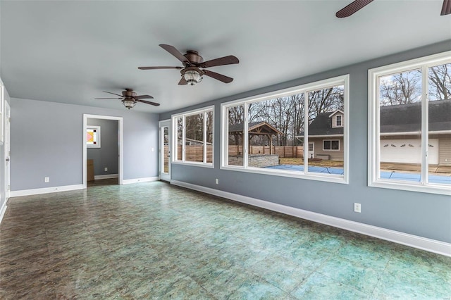 spare room with ceiling fan