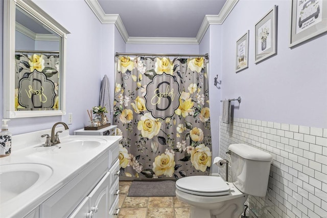 bathroom with crown molding, tile walls, vanity, a shower with curtain, and toilet