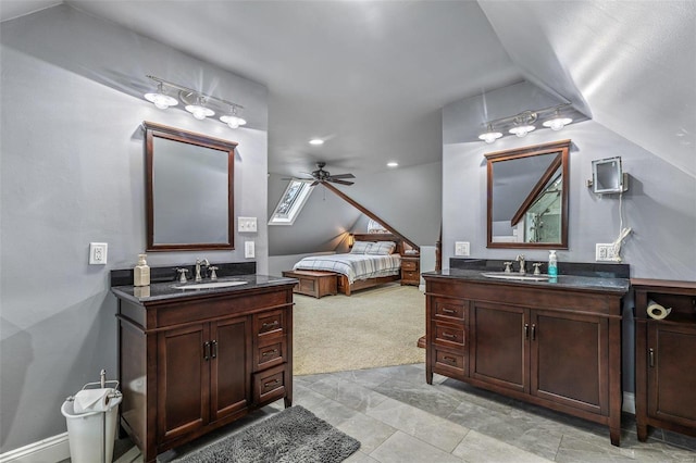 bathroom with vanity, lofted ceiling, and ceiling fan