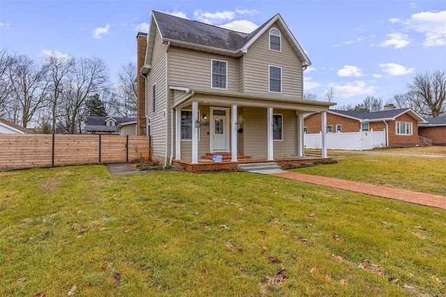 view of front of house featuring a porch and a front yard