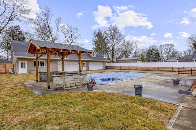 view of patio featuring a covered pool