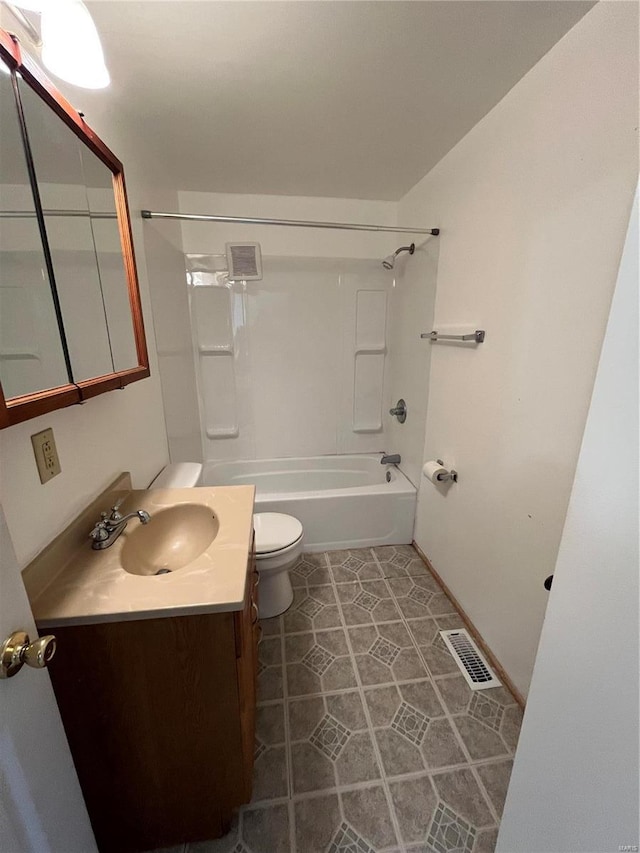 full bathroom with shower / washtub combination, toilet, and vanity