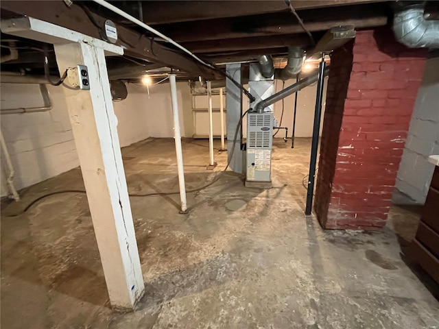 basement featuring heating unit