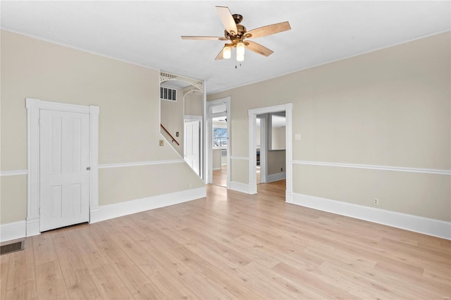 spare room with ceiling fan and light hardwood / wood-style flooring