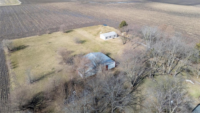 birds eye view of property with a rural view