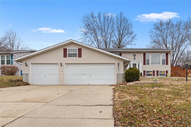 view of front of home featuring driveway and an attached garage