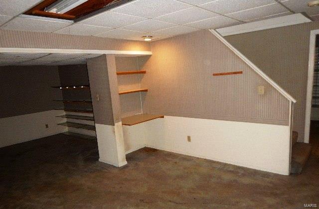 basement with a drop ceiling