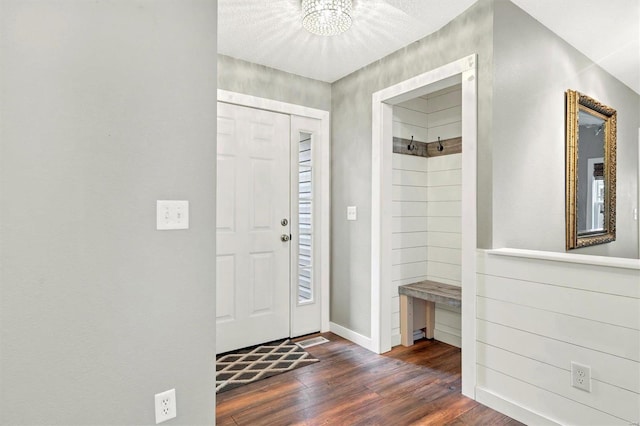 foyer with dark hardwood / wood-style flooring