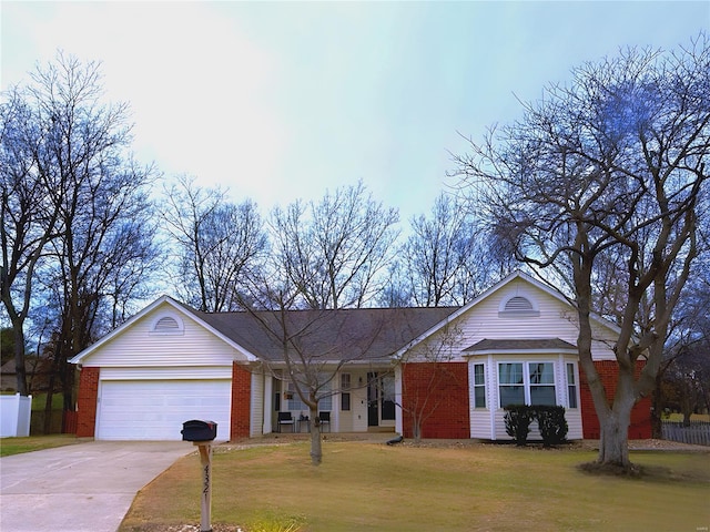 single story home featuring a garage and a front yard