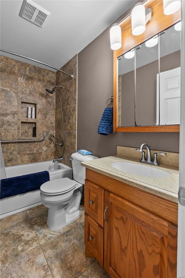 full bathroom with vanity, shower / bath combination with curtain, and toilet