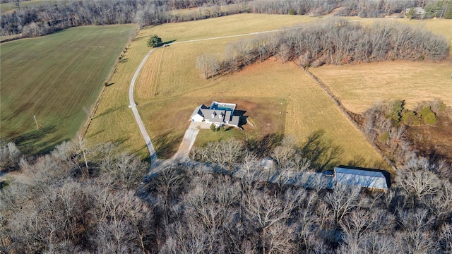 birds eye view of property with a rural view