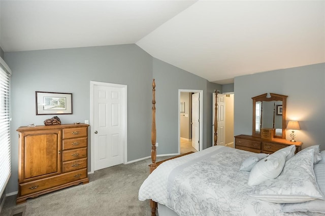 bedroom featuring lofted ceiling and light colored carpet