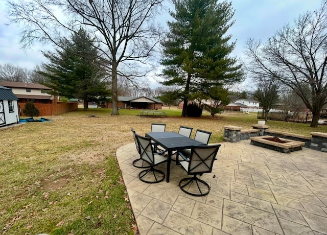 view of patio / terrace with a storage unit