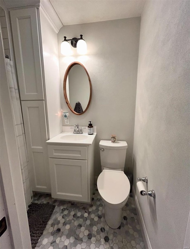 bathroom with vanity and toilet