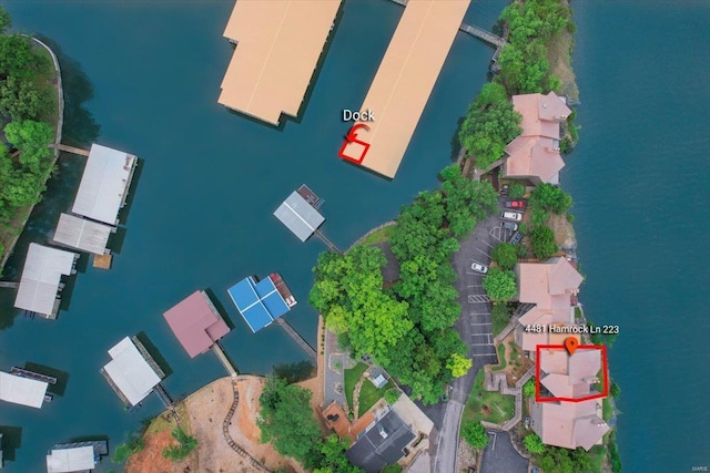 birds eye view of property featuring a water view