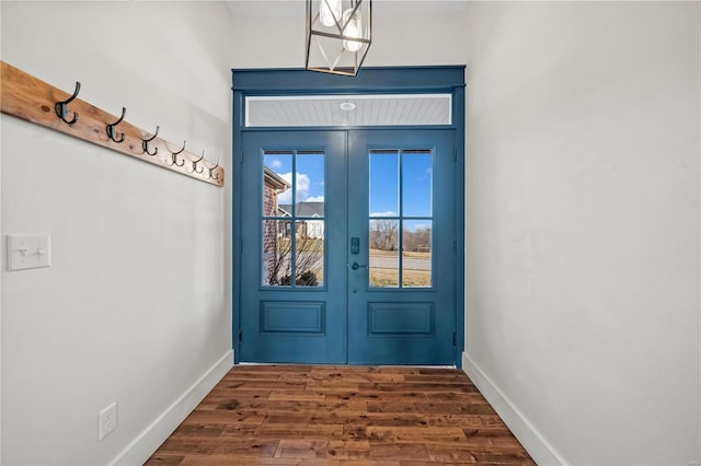 doorway to outside with dark hardwood / wood-style floors and french doors