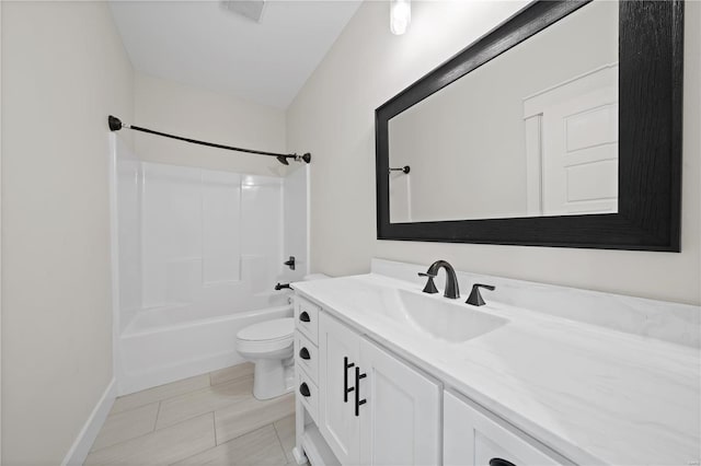 full bathroom with vanity, washtub / shower combination, and toilet