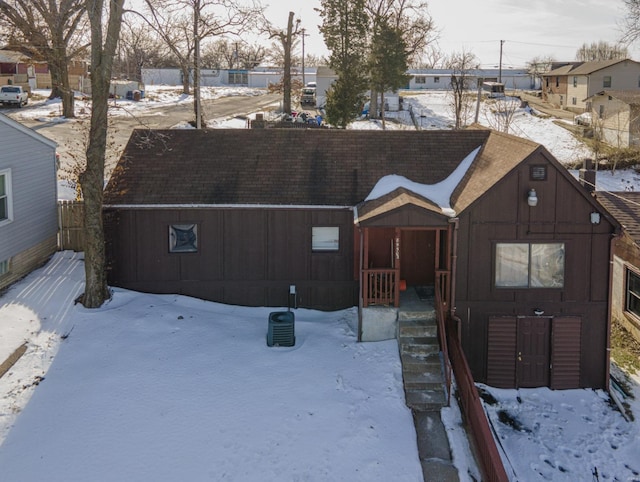 view of snow covered house