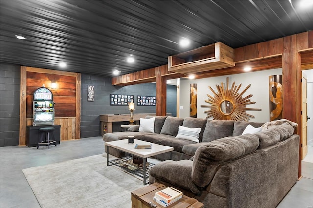 cinema room featuring wooden ceiling