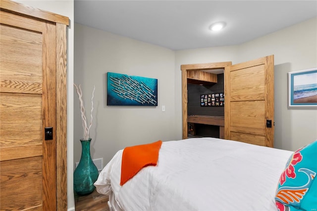 bedroom featuring hardwood / wood-style floors