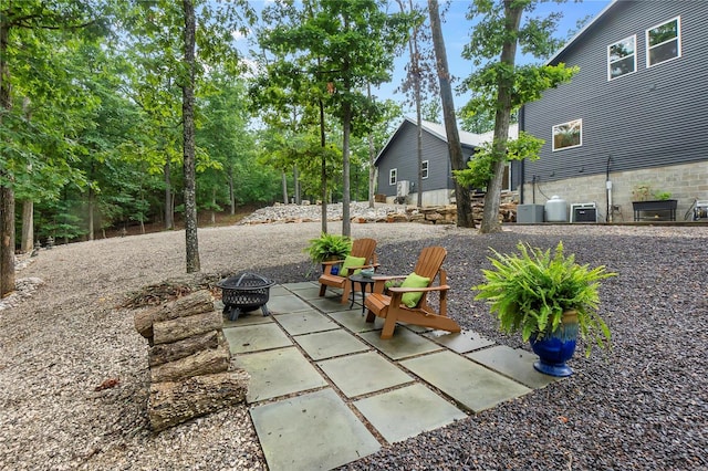 view of patio featuring a fire pit