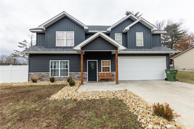 craftsman inspired home with a garage