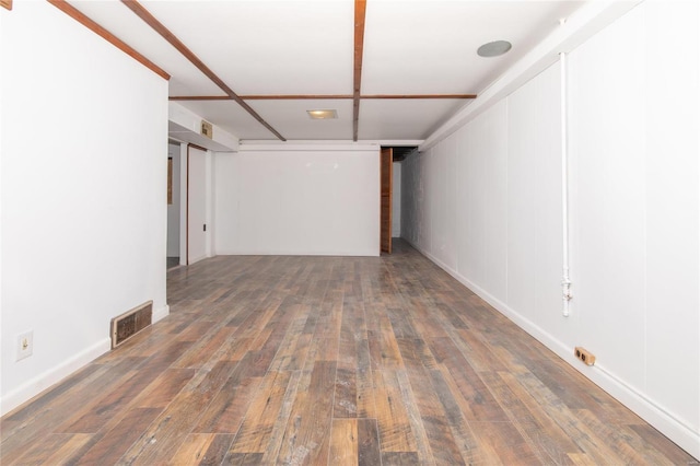 basement featuring dark hardwood / wood-style floors