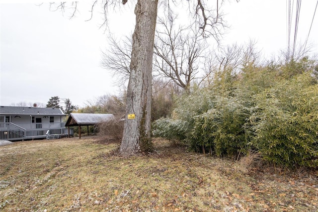 view of yard with a deck