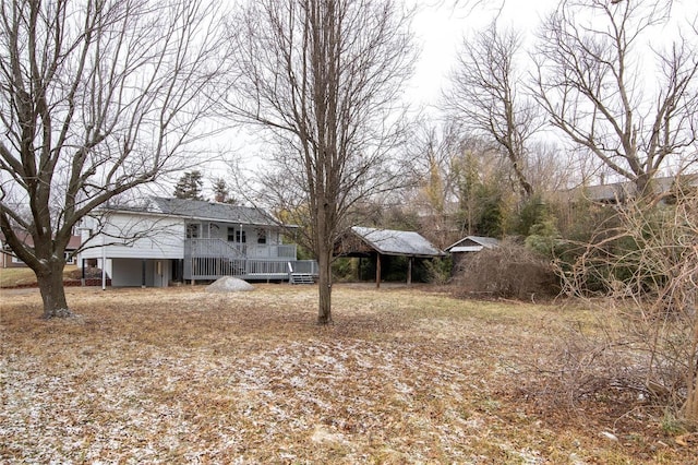 view of yard with a wooden deck